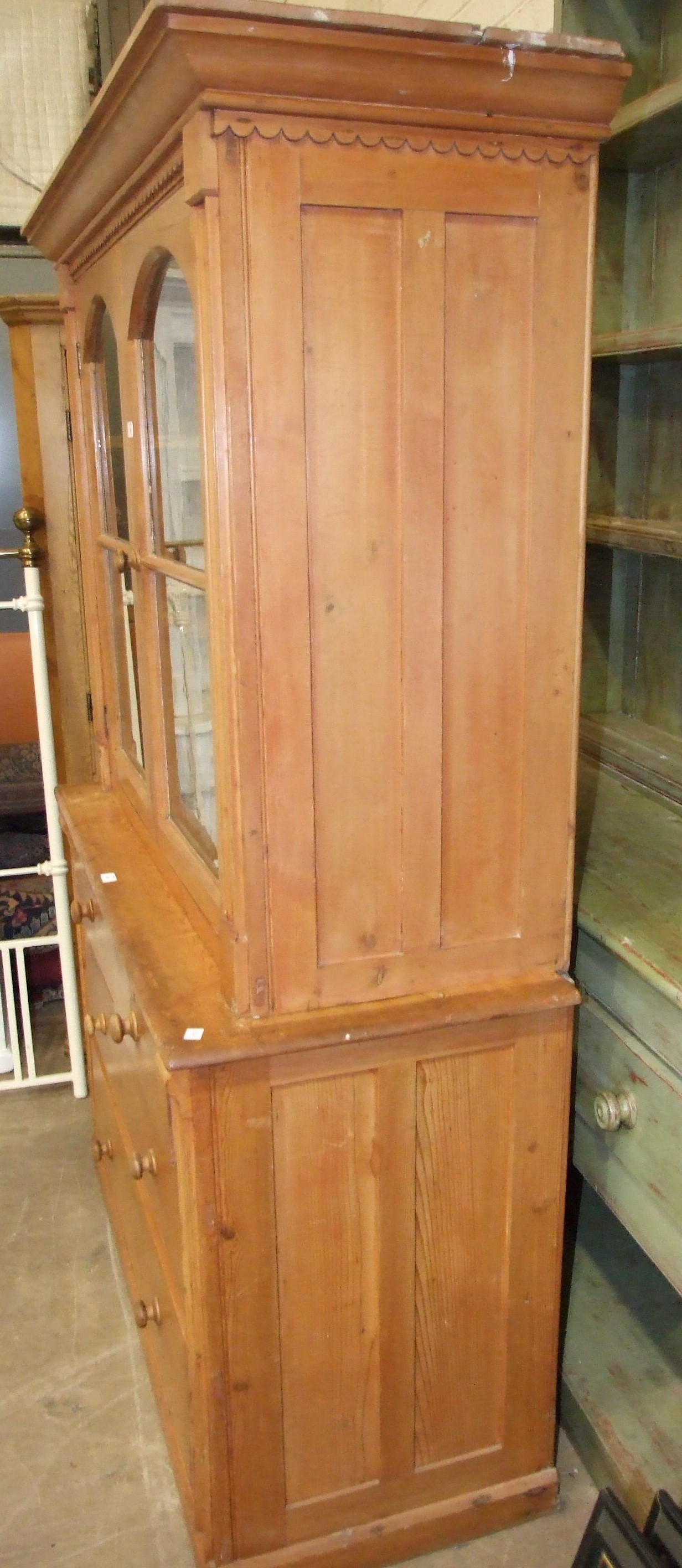 A pine dresser, the shelved upper section fitted with a pair of glazed doors above two short and two - Image 2 of 3