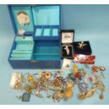 A quantity of costume jewellery and a musical jewellery box.