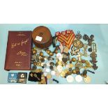 A collection of military badges, buttons, coins, a BESL 'Lest We Forget' 1940 Empire Unity diary and