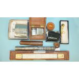 Otis Kings Patent Calculator in leather case, three Ronson cigarette lighters and other items.