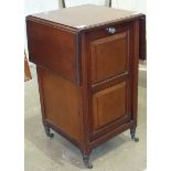 A mahogany coal purdonium with panelled door, wicker lining basket and the top with folding