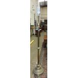 A late-19th/early-20th century brass adjustable lamp standard, on circular base and three feet, (