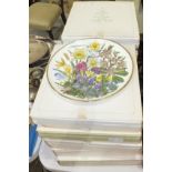 Eleven Franklin Porcelain 'Flowers of the Year' plate collection, (ten boxed).