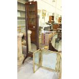 A 20th century mahogany cheval mirror, 161cm high and a painted wood triptych mirror, 54cm high.