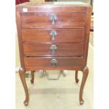 A mahogany music cabinet, having four drawers on cabriole legs, 48cm wide, 79cm high.