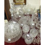 A collection of cut glassware, including decanters, bowls, sundae glasses, etc.