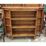 A reproduction burr elm open dwarf bookcase with concave corners, 109cm wide, 90cm high.