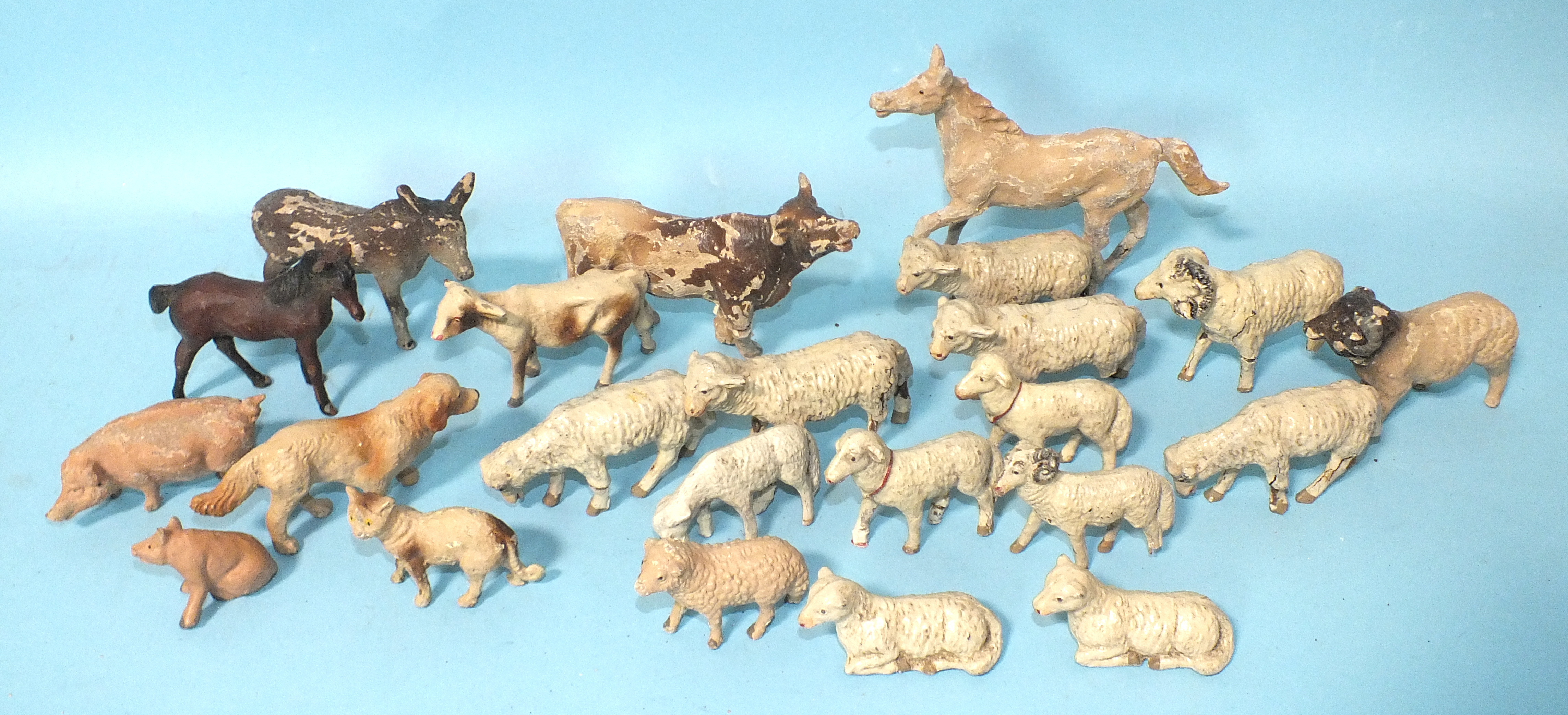 A quantity of composition farmyard animals: sheep (x14), cow and calf, horse and foal, donkey, pig