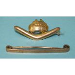 A 9ct gold "Australia" brooch and a 9ct gold tie pin, 4.8g gross weight, (2).