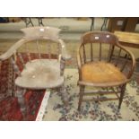 An elm and beech captain's chair, old woodworm to one arm and an elm and oak office chair, (2).