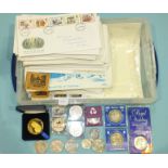 A collection of first day covers, coins, etc.