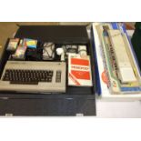 A Commodore 64 Microcomputer with games and accessories, a Commodore Music Maker accessory and a