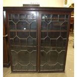 A Georgian mahogany astragal-glazed bookcase top with dentil cornice, 120cm wide, 130cm high and a