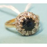 A sapphire and diamond cluster ring with 18ct gold mount, size M, 5g.
