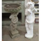 A cast concrete cherub bird bath, 82cm high and a cast concrete figure 'female water carrier',