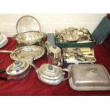 Various plated entree dishes and covers, plated cutlery and other metalware.