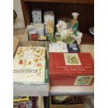 A collection of modern Beatrix Potter ceramic figures, children's books, a Staffordshire figure of