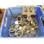A collection of brass curtain rings, a servants bell handle, a plated wine bottle holder and other