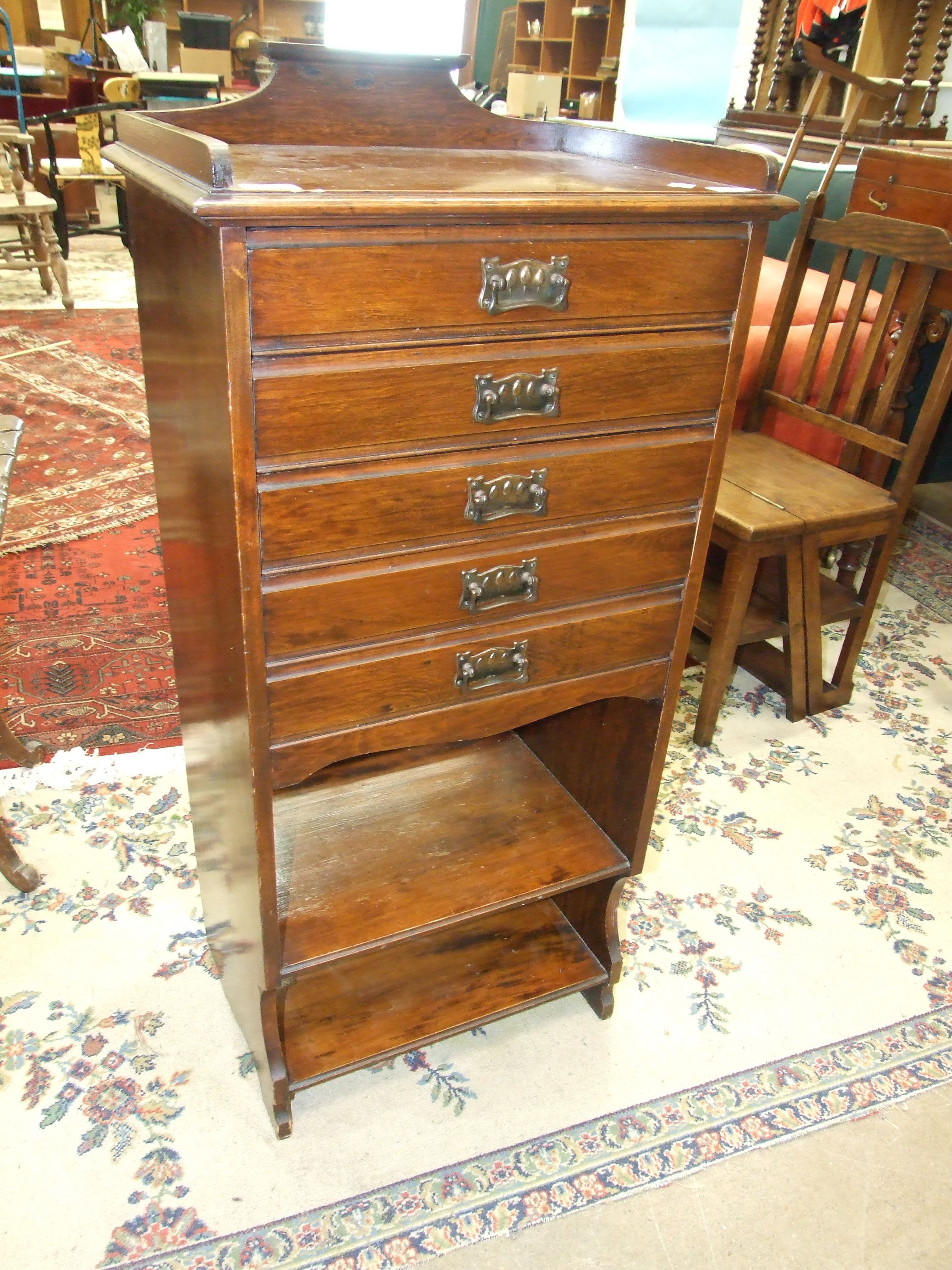 An Edwardian stained wood music cabinet of five drop-down doors above two shelves, 50cm wide, - Image 2 of 2