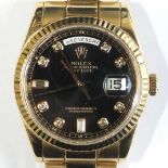 A gentleman's 18ct gold Rolex Oyster Day-Date wrist watch c2008, the fluted bezel enclosing a