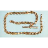 A Victorian 9ct gold fancy-link half-Albert watch chain with plated T-bar, 28.8g gross weight.