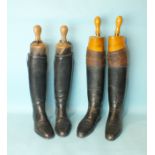 A pair of gentleman's leather riding boots with fitted wood trees, together with a pair of lady's