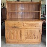 A South African rail sleeper wood dresser, the two shelves above two drawers and two cupboard doors,