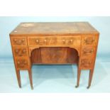 A George III gentleman's mahogany fitted dressing table, the hinged lift top enclosing a folding