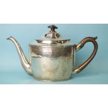 A George III silver teapot of oval outline, with domed hinged lid and chased decoration, with