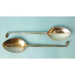 A pair of modern silver teaspoons in the form of golf clubs, Sheffield 1958 and 1963, maker EV, (2).