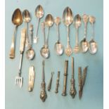 A collection of modern commemorative teaspoons, silver-mounted manicure items, propelling pencil and