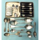 A set of six modern coffee spoons in case, an engine-turned cigarette case, Birmingham 1918 and a