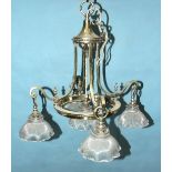 A late-19th/early-20th century brass five-light institutional hanging light fitting, with five