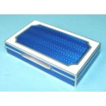 Cartier, an enamelled silver box of rectangular form, the lid with blue guilloche enamel panel,