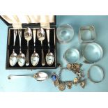 Three various silver napkin rings, a cased set of six modern teaspoons and other items.