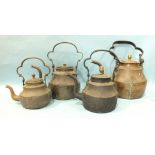 Four late-19th century graduated copper and brass 'Dartmoor' kettles, each with elongated spout