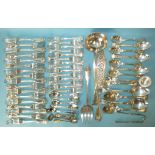 A collection of mainly 19th century fiddle and shell pattern flatware, including a pair of fish