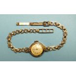 A lady's Rotary 9ct gold wristwatch, (working), on gold bracelet, 11g gross weight.