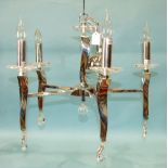 A chrome and cut-glass Swarovski six-branch electrolier with cut-glass drops, 75cm diameter, 50cm