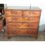 A late-Georgian mahogany chest of two short and three long cockbeaded drawers, on bracket feet,