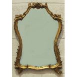 A gilt carved wood mirror frame in the Chinese Chippendale taste, 184 x 61cm overall, with later