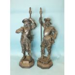 A pair of spelter lamp holders in the form of Elizabethan military figures, 64cm high, (2).