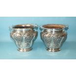 A pair of silver-plated Britannia metal wine coolers embossed with flowers, by Walker & Hall, 19cm