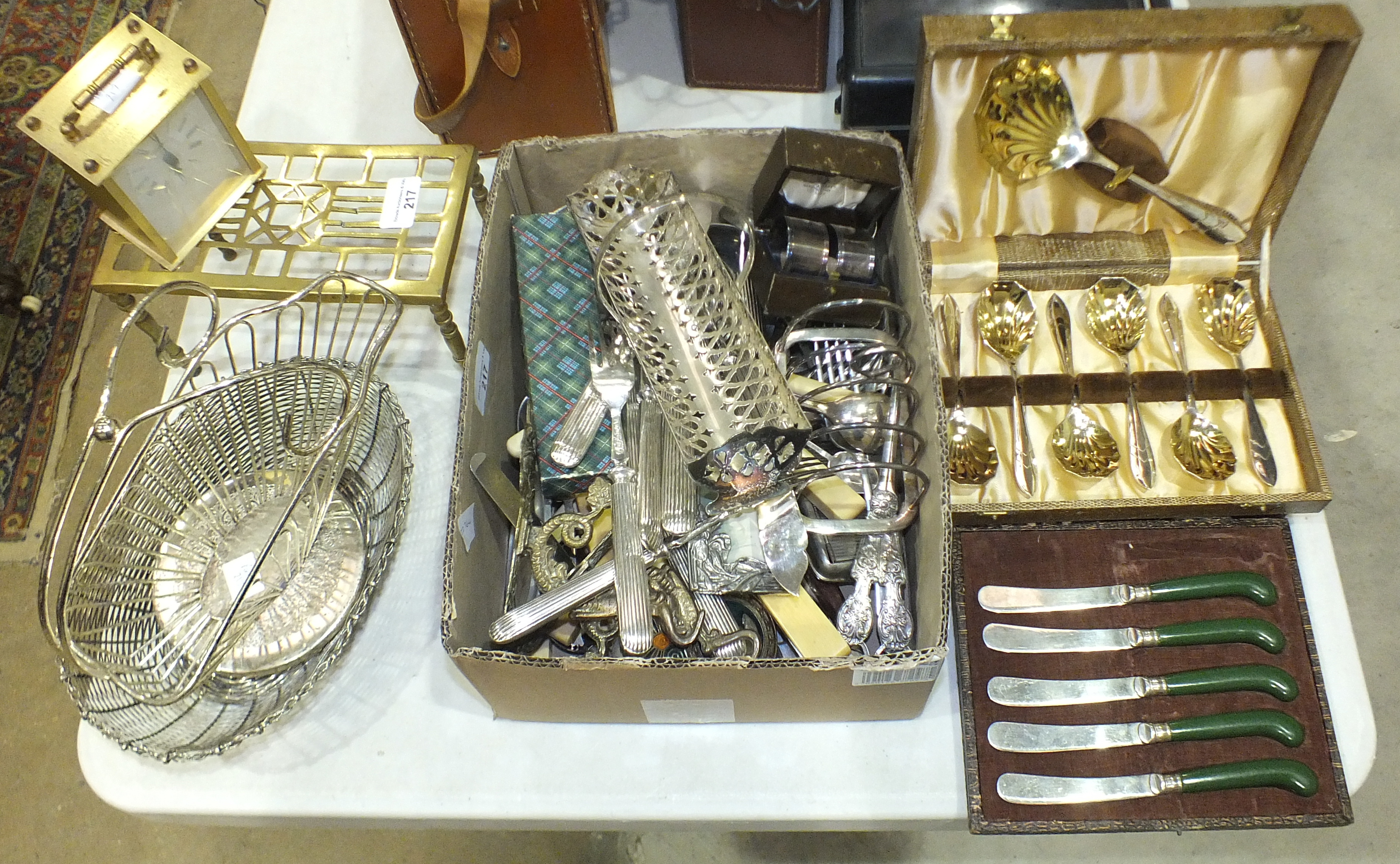 A collection of plated cutlery and other metalware.