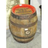 An oak and metal-bound beer barrel stamped Young & Co. Brewery Ltd, London, 53cm high.