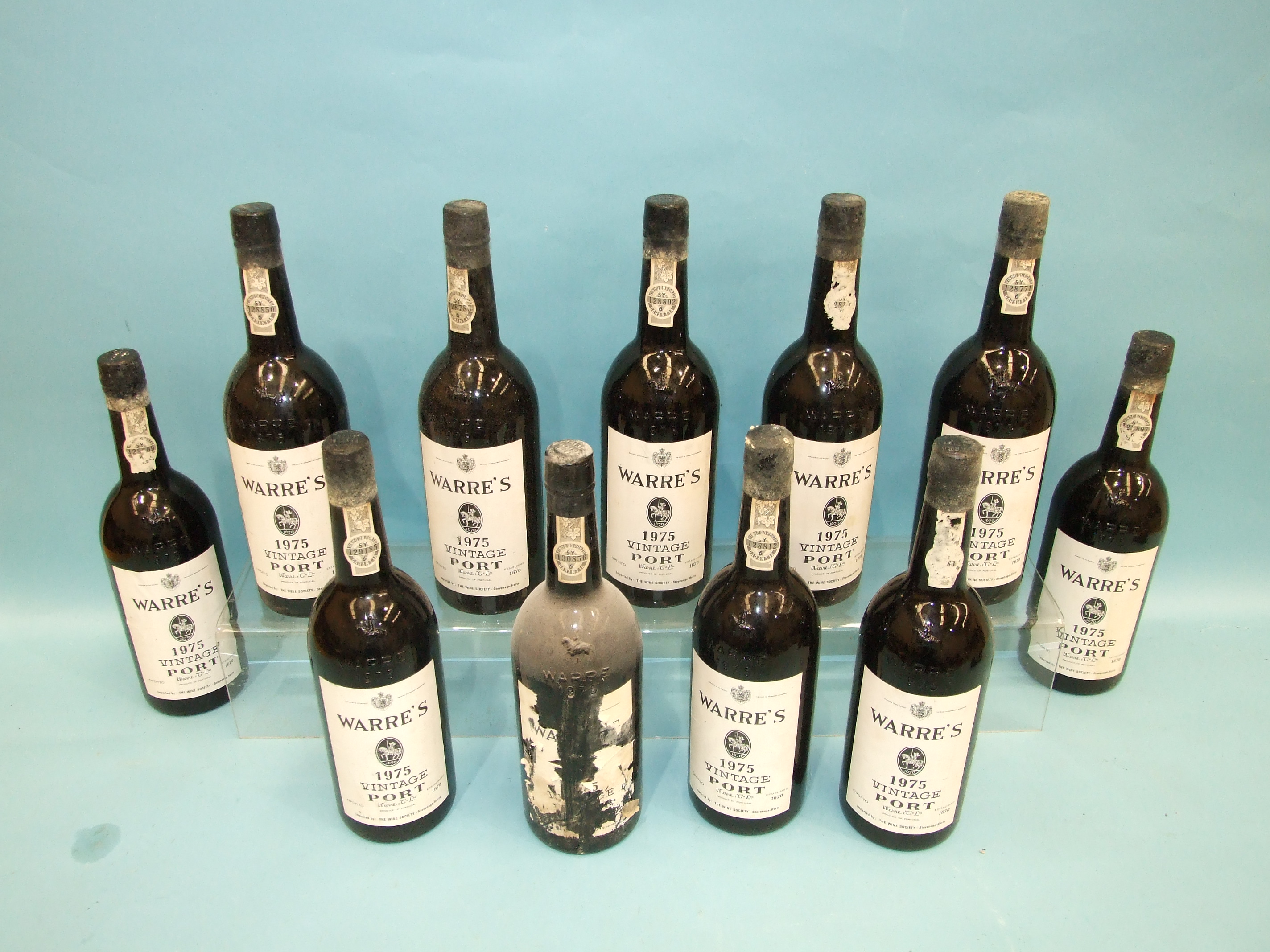 Warres vintage Port 1975, eleven bottles, in cardboard case, (some labels damaged), (11). - Image 2 of 3