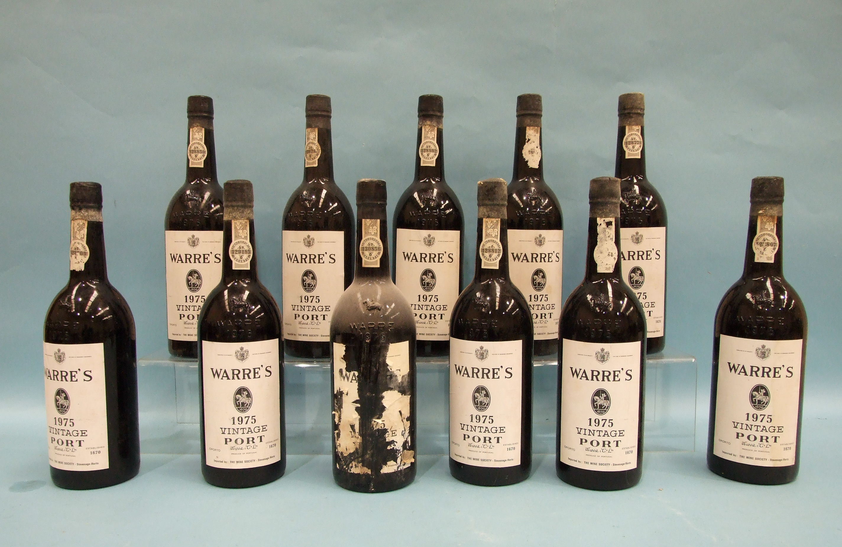 Warres vintage Port 1975, eleven bottles, in cardboard case, (some labels damaged), (11).