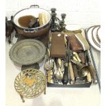 A collection of plated cutlery, including horn-handled carving knife and fork, a brass tazza, the