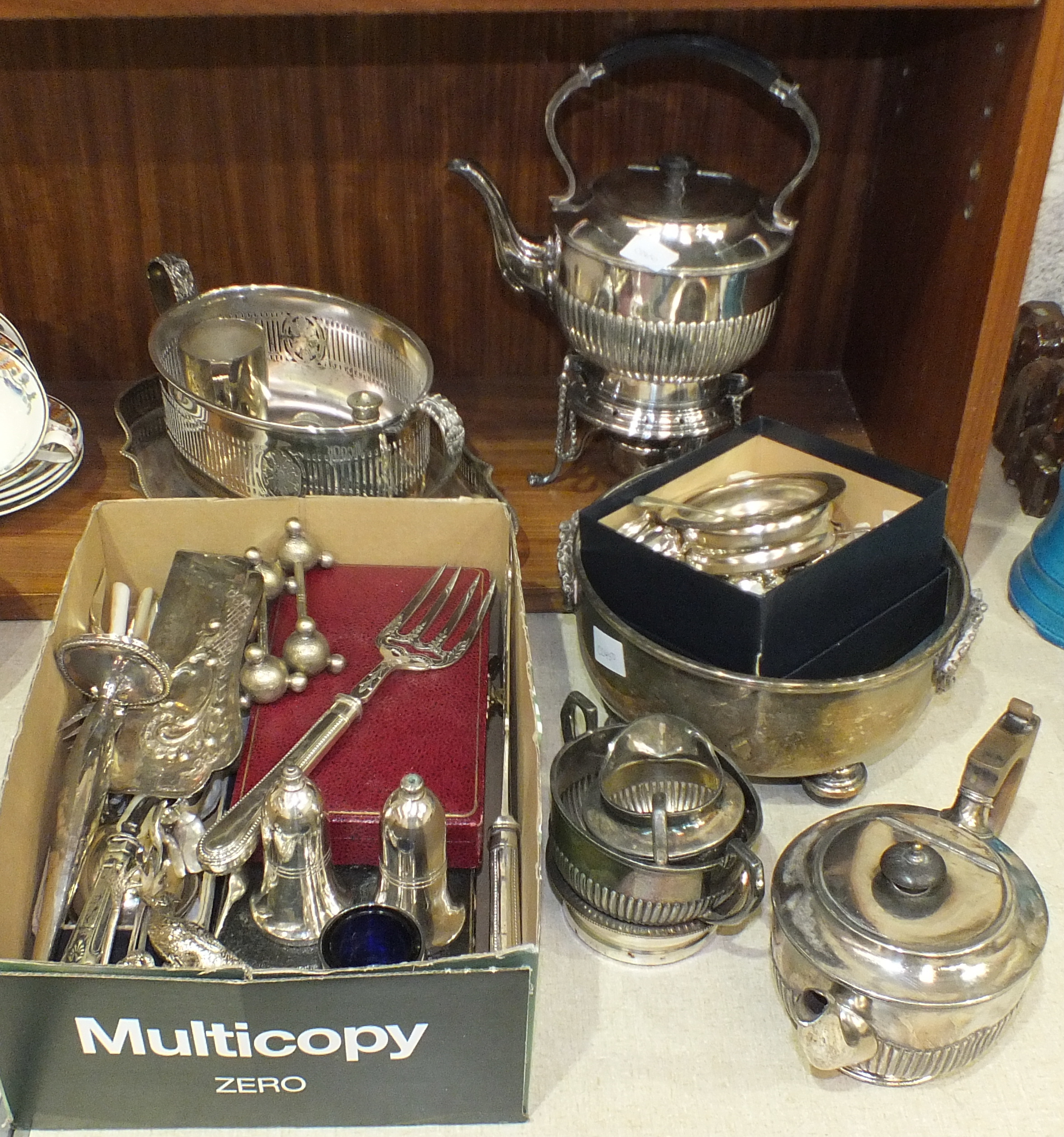 A plated spirit kettle on stand with burner, a three-piece bachelors plated tea service, various