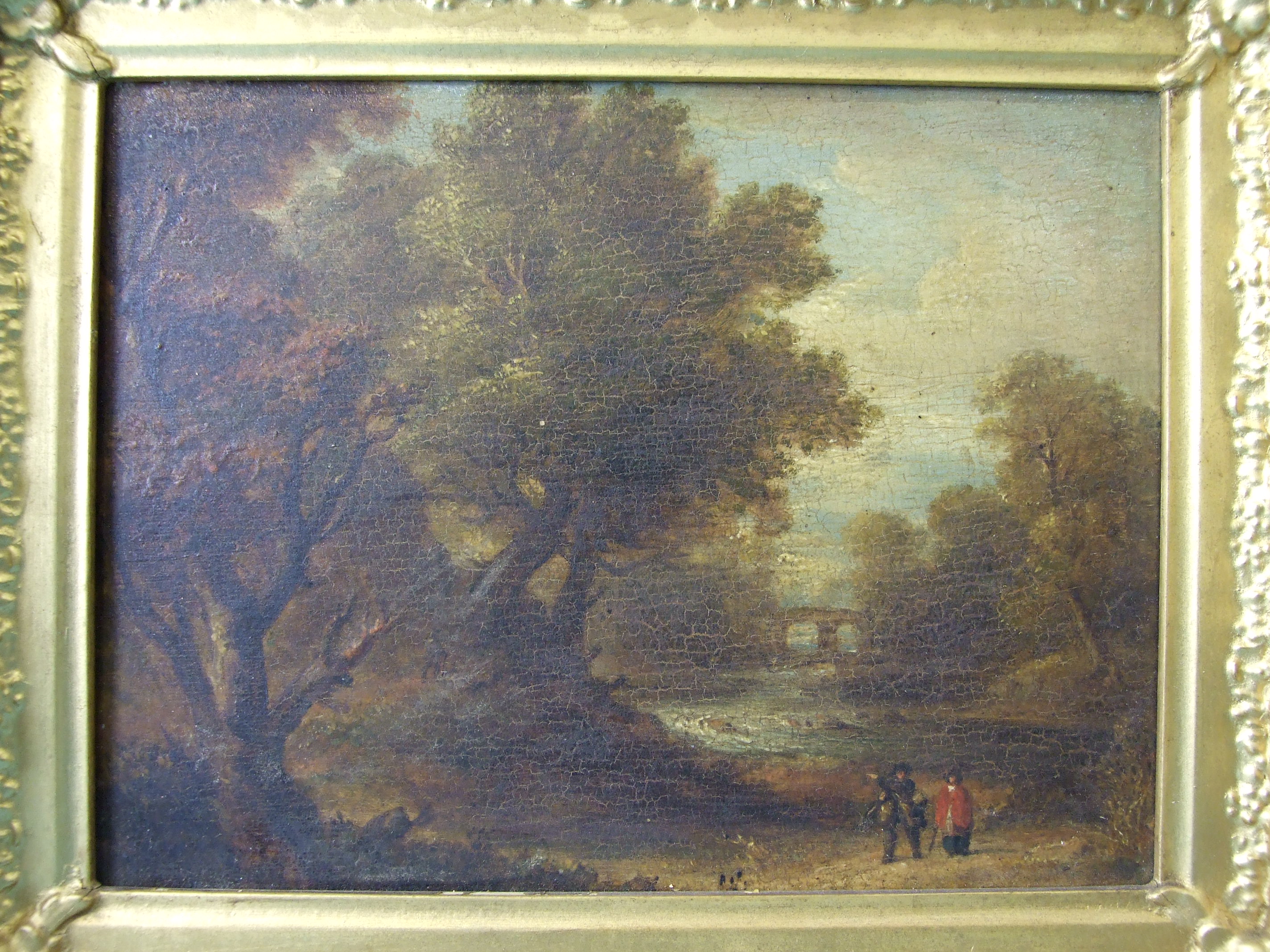 Continental School, 'Figures walking by a river with a bridge in the distance', an unsigned oil on